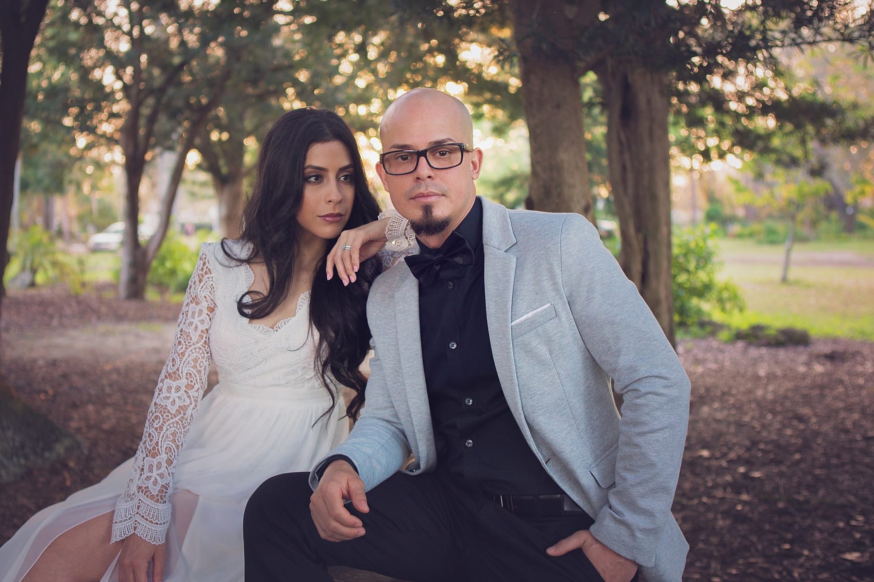 bride looking at her groom during a photo shoot at mead botanical garden in winter park after their courthouse elopement in orlando at the orange county courthouse