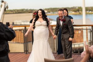 wedding couple getting married at the boathouse at disney springs