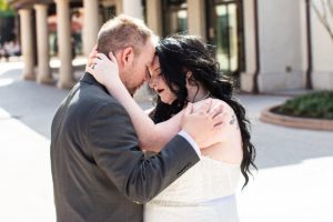 photography of bride and groom after getting married at disney springs