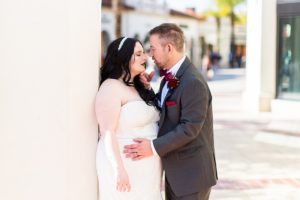 photography of wedding couple after getting married at disney springs