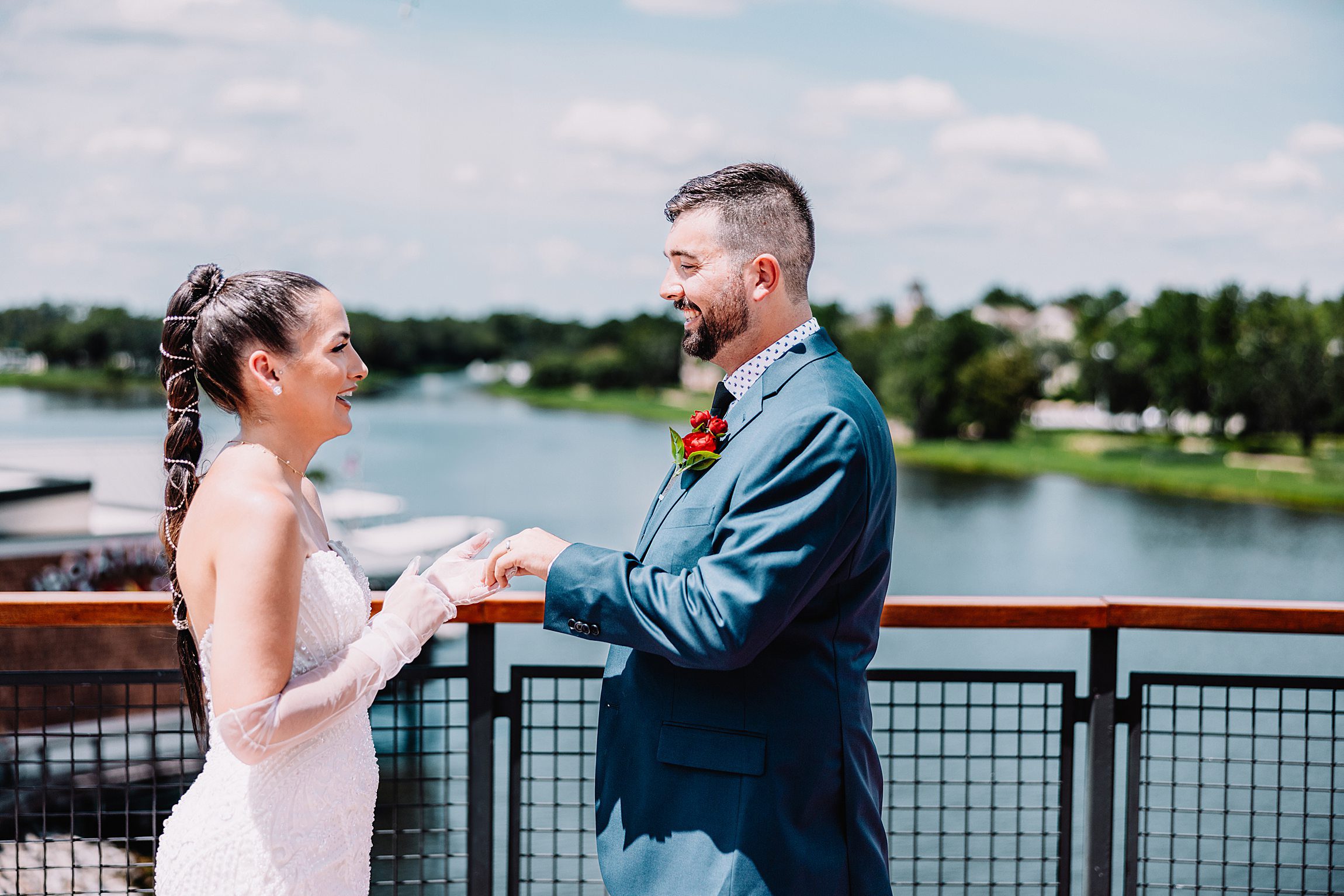 Couple getting married on the balcony of paddlefish restaurant at disney springs in orlando florida