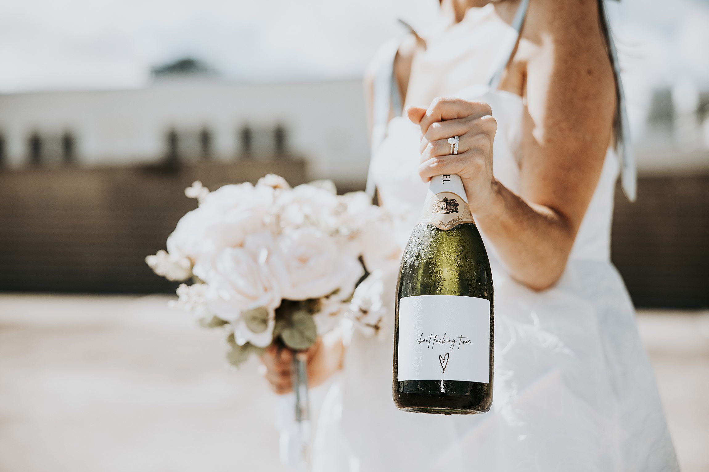 champagne bottle with custom printed label for wedding
