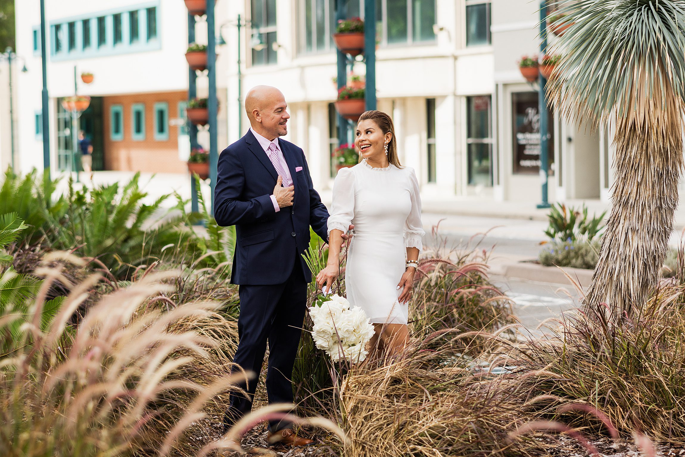 couple posing together after their micro wedding at the orange county courthouse in downtown orlando