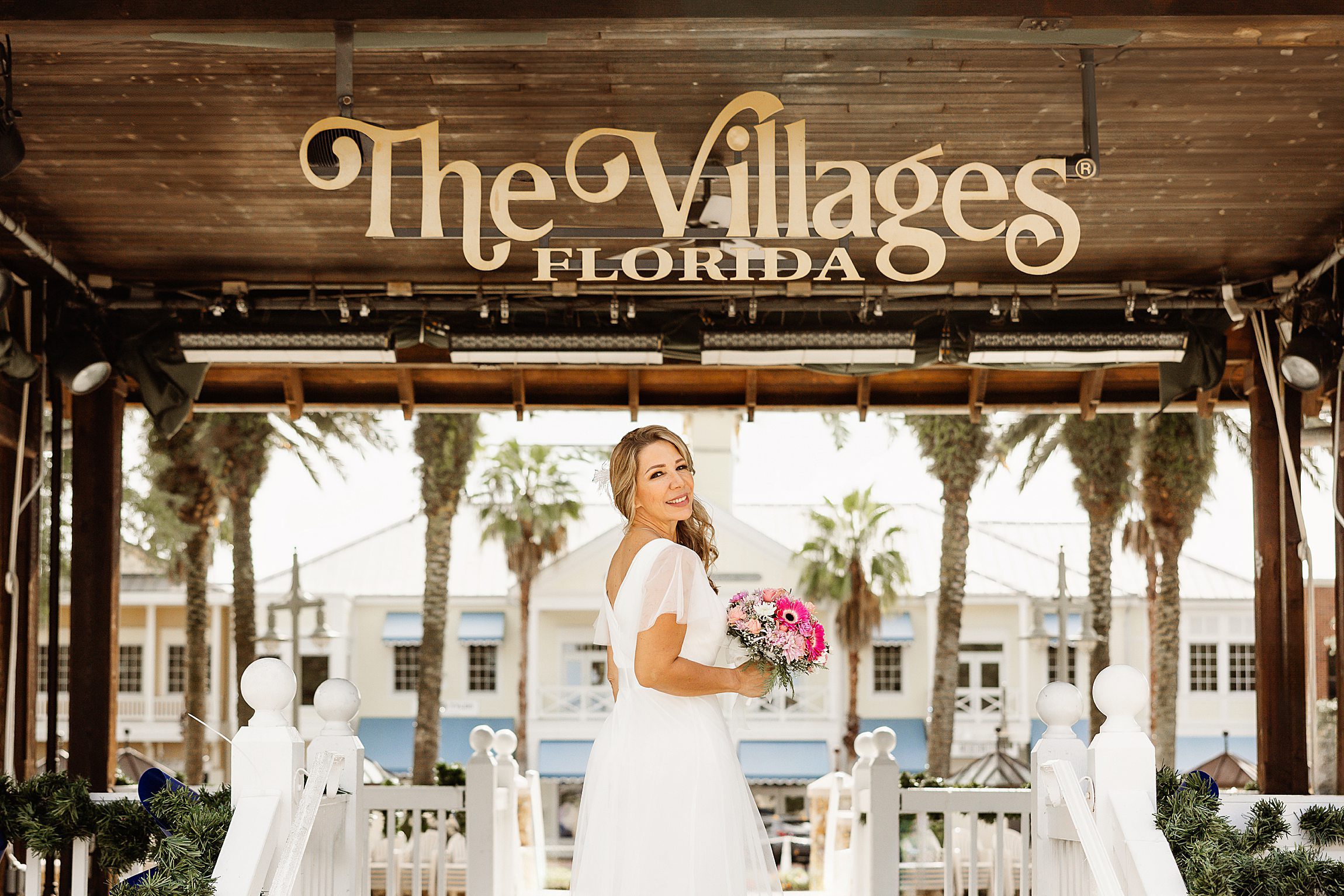 bride poses after her micro wedding in the villages in florida