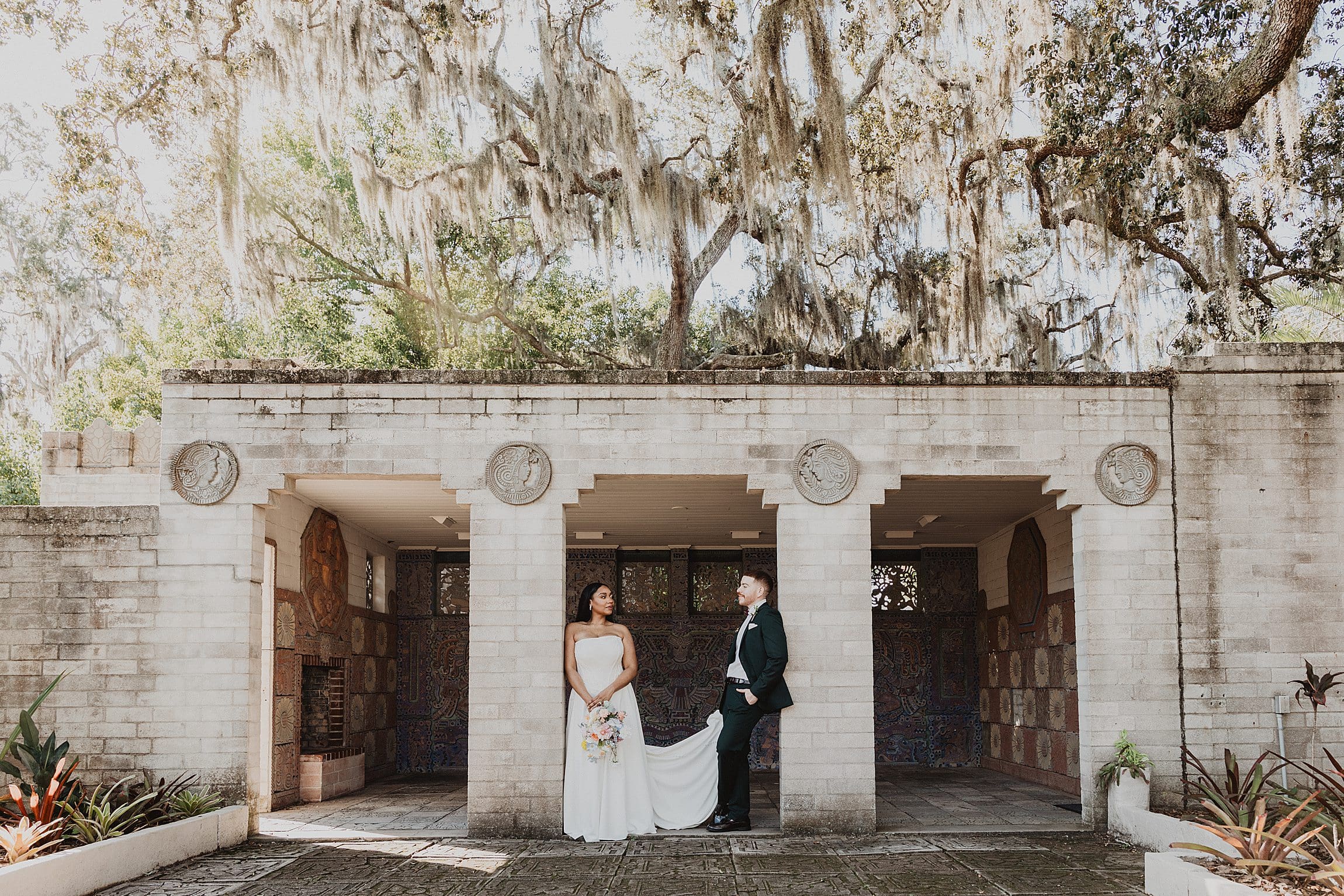 couple portrait inside the chapel archway at a micro wedding at Maitland Art and History Center captured by Gracie May Photography