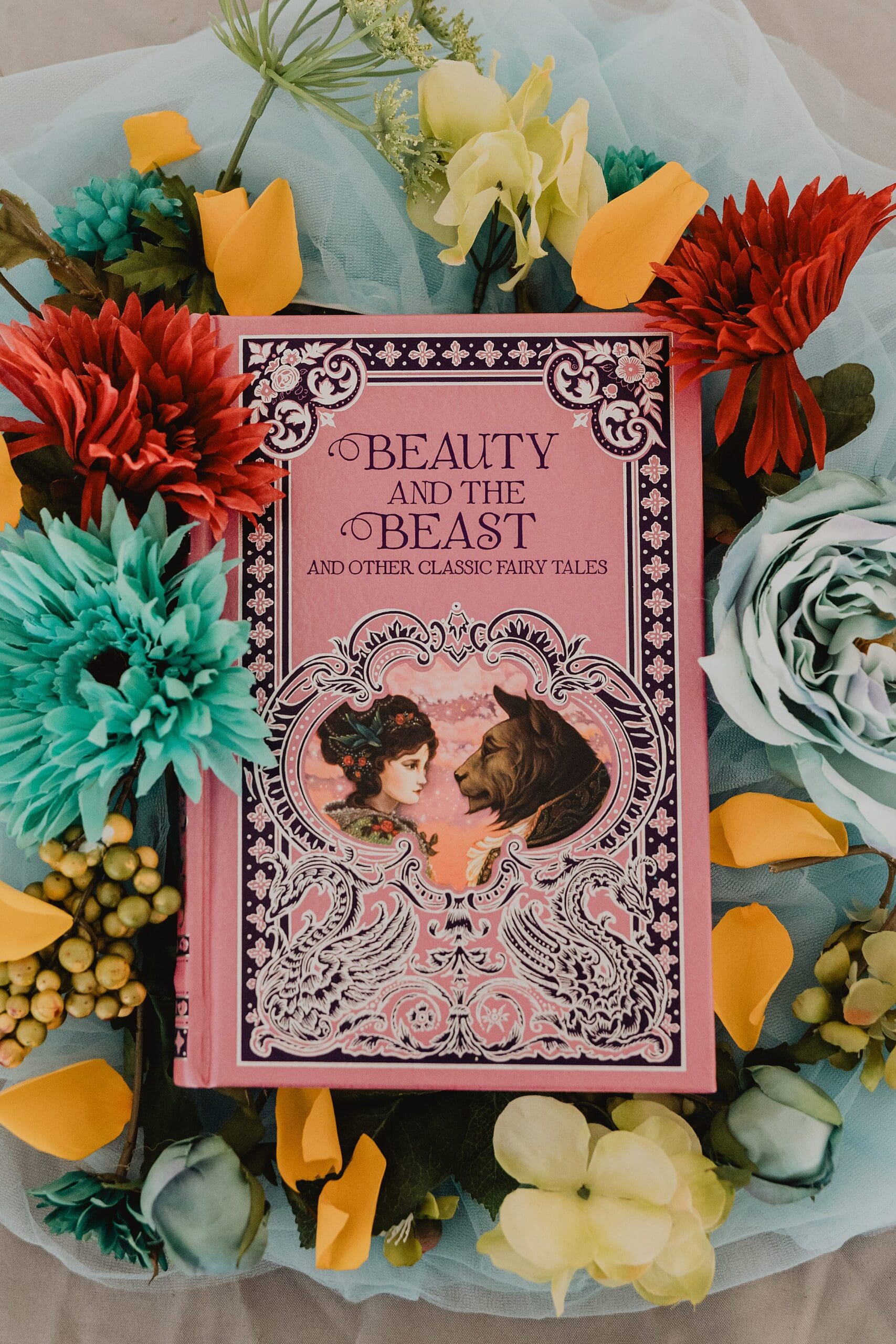 Beauty and the Beast book details shot at a wedding at the Lady of the Lakes Renaissance Faire near Orlando, Florida, captured by Gracie May Photography