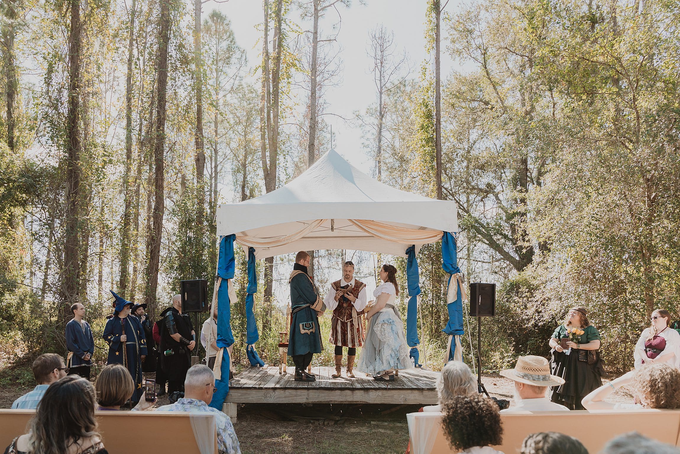 bride and groom in renaissance attire at their wedding at the Lady of the Lakes Renaissance Faire near Orlando, Florida, captured by Gracie May Photography