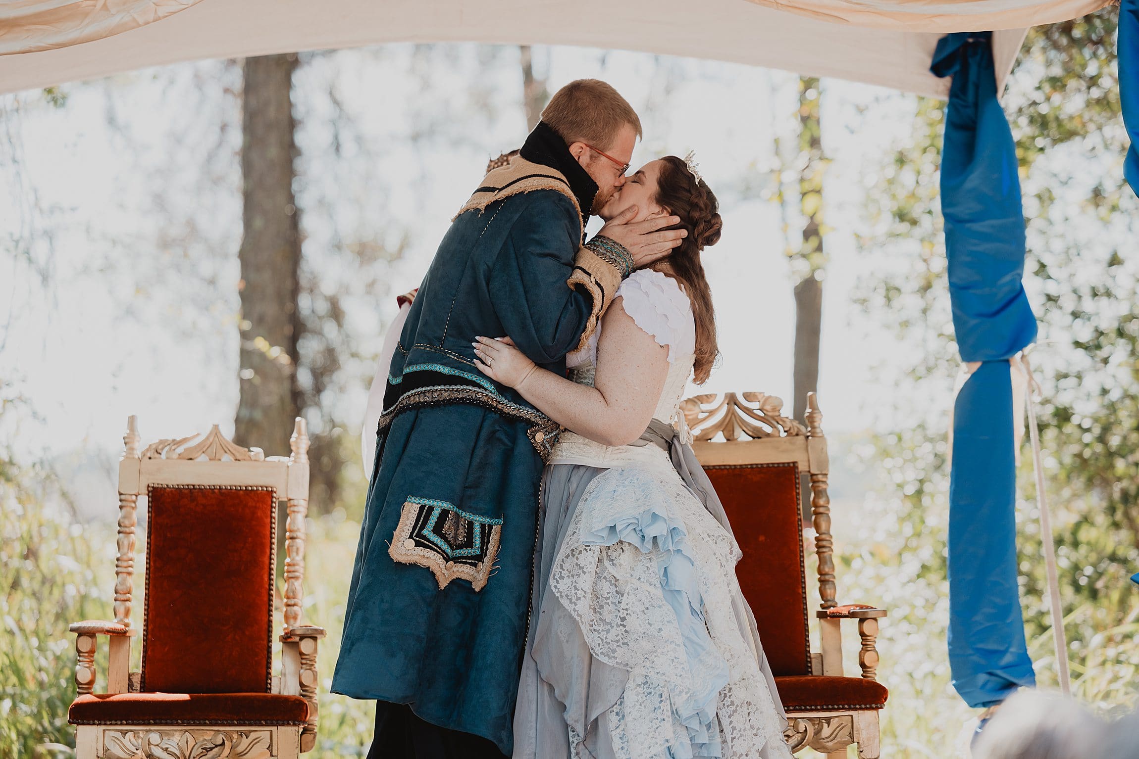 bride and groom in renaissance attire at their wedding at the Lady of the Lakes Renaissance Faire near Orlando, Florida, captured by Gracie May Photography