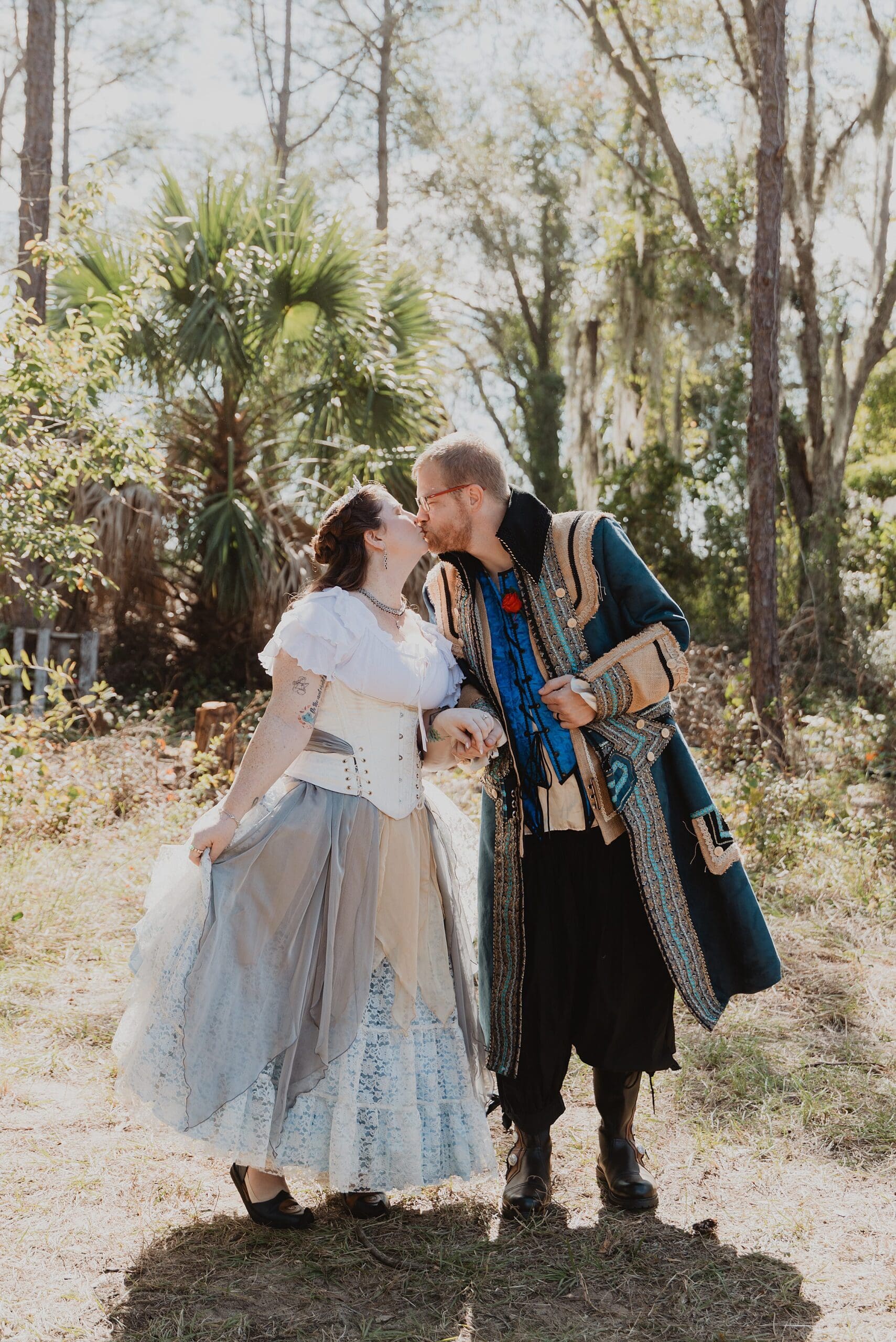 bride and groom in renaissance attire at their wedding at the Lady of the Lakes Renaissance Faire near Orlando, Florida, captured by Gracie May Photography