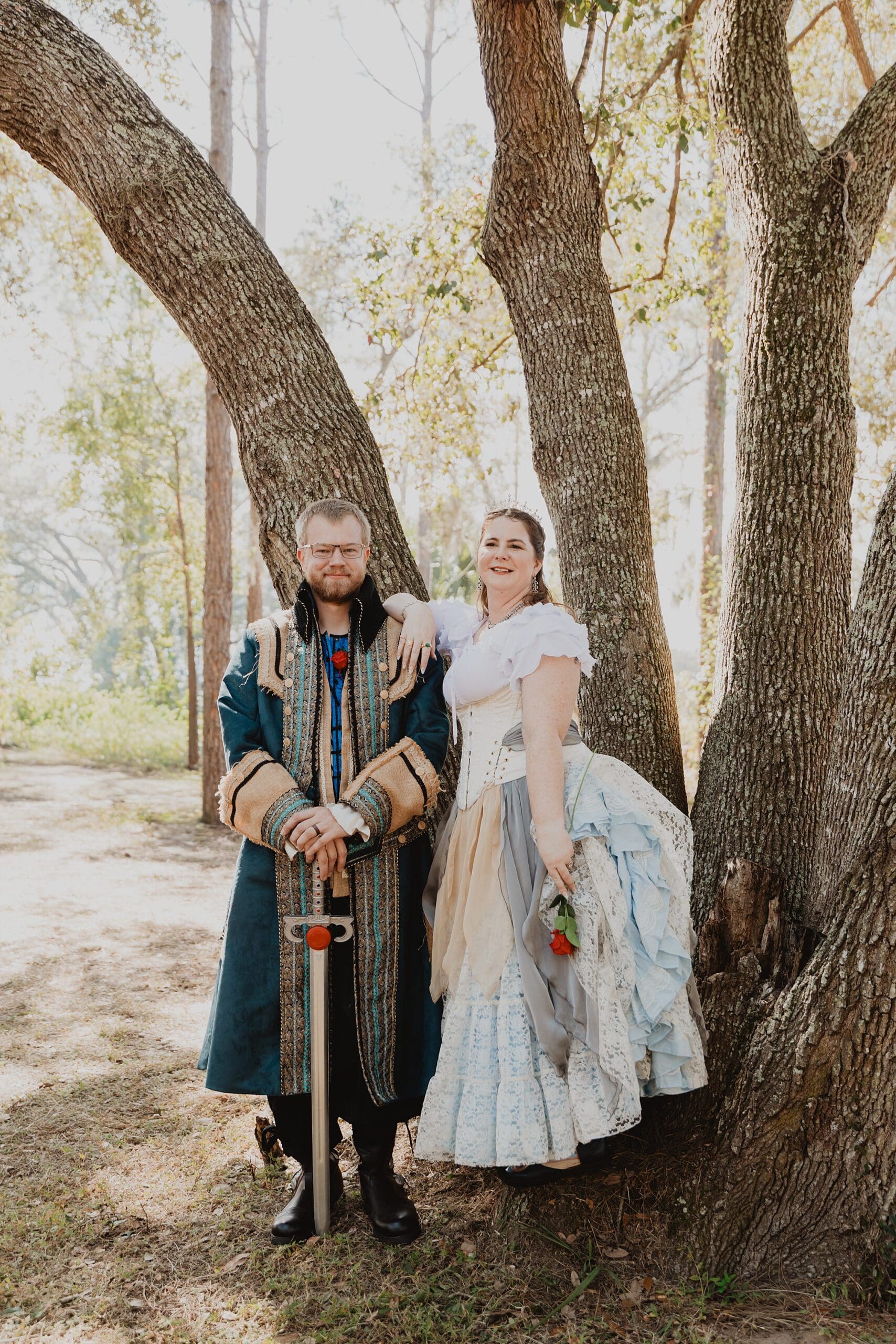 bride and groom in renaissance attire at their wedding at the Lady of the Lakes Renaissance Faire near Orlando, Florida, captured by Gracie May Photography