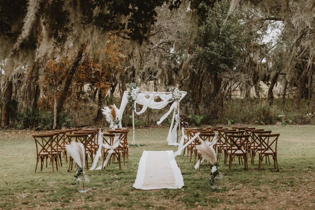 backyard wedding ceremony setup in Mount Dora, Florida, captured by microwedding photographer Gracie May Photography