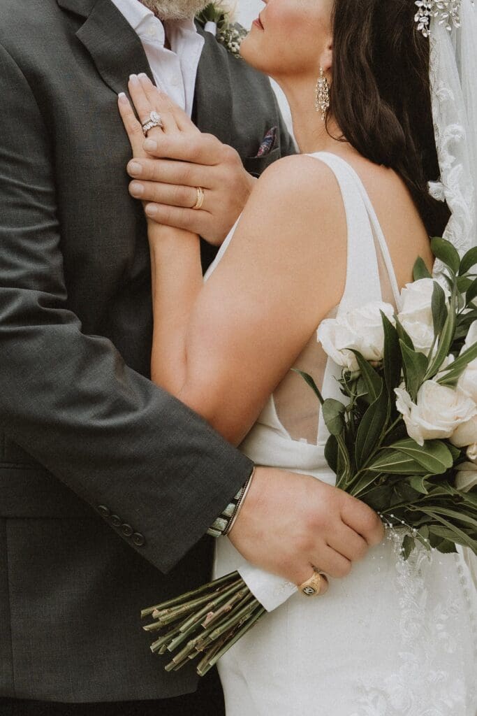bride and groom portraits during their backyard wedding in Mount Dora, Florida, captured by microwedding photographer Gracie May Photography