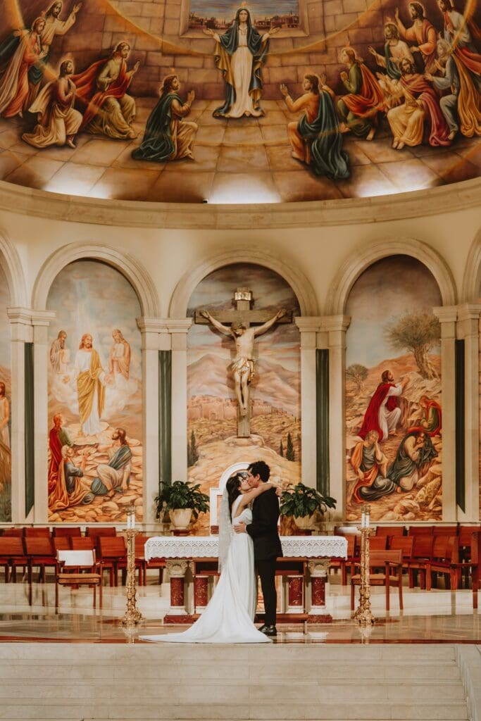 bride and groom during their micro wedding ceremony at St. James Cathedral in Orlando captured by Gracie May Photography