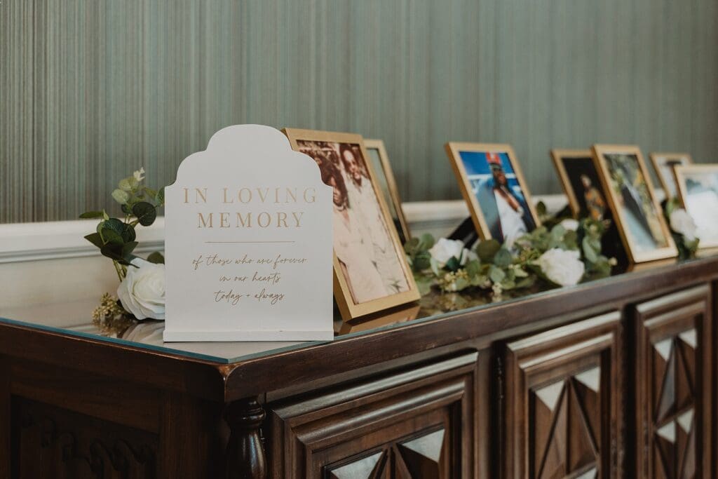 in loving memory wedding card with photos of departed loved ones at a wedding at Lake Mary Events Center in Florida, captured by Gracie May Photography