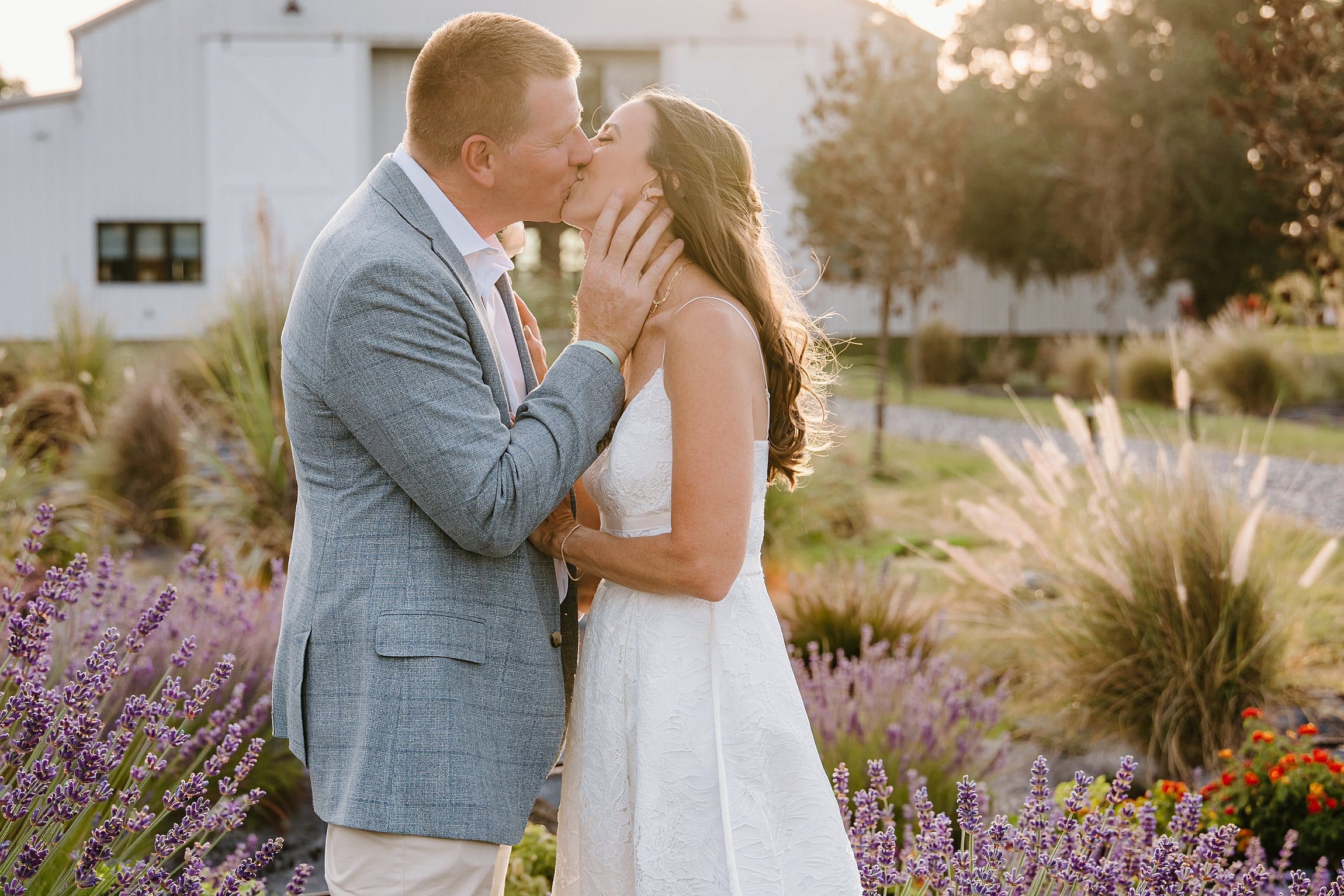 bride and groom in front of Lavender on the Lake in St Cloud, Florida, during their micro wedding captured by Gracie May Photography