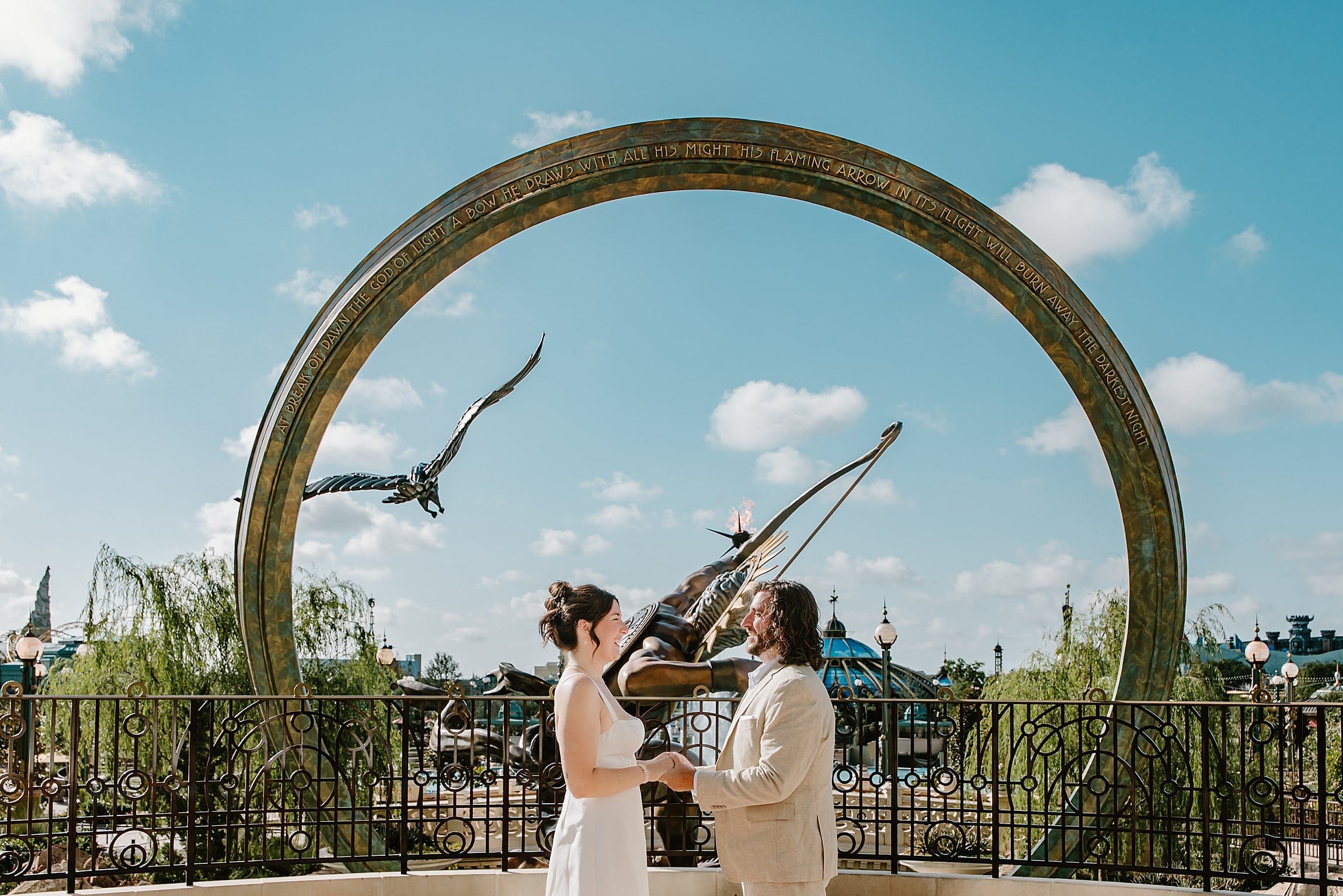 a couple during their elopement marriage ceremony in the celestial park at epic universe