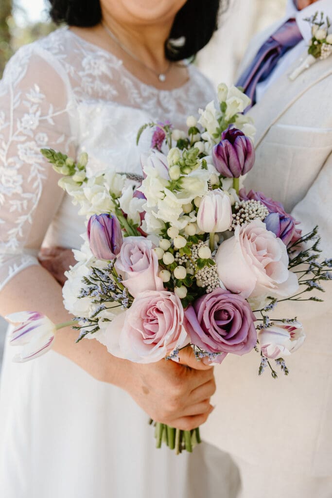 bride portrait with a lavender bouquet during a wedding ceremony at Sumter County Clerk's Office in the Villages Florida, captured by Gracie May Photography