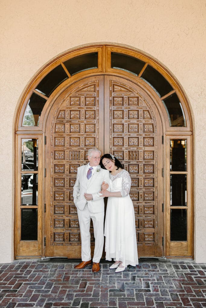 bride and groom portraits after a wedding ceremony at Sumter County Clerk's Office in the Villages Florida, captured by Gracie May Photography