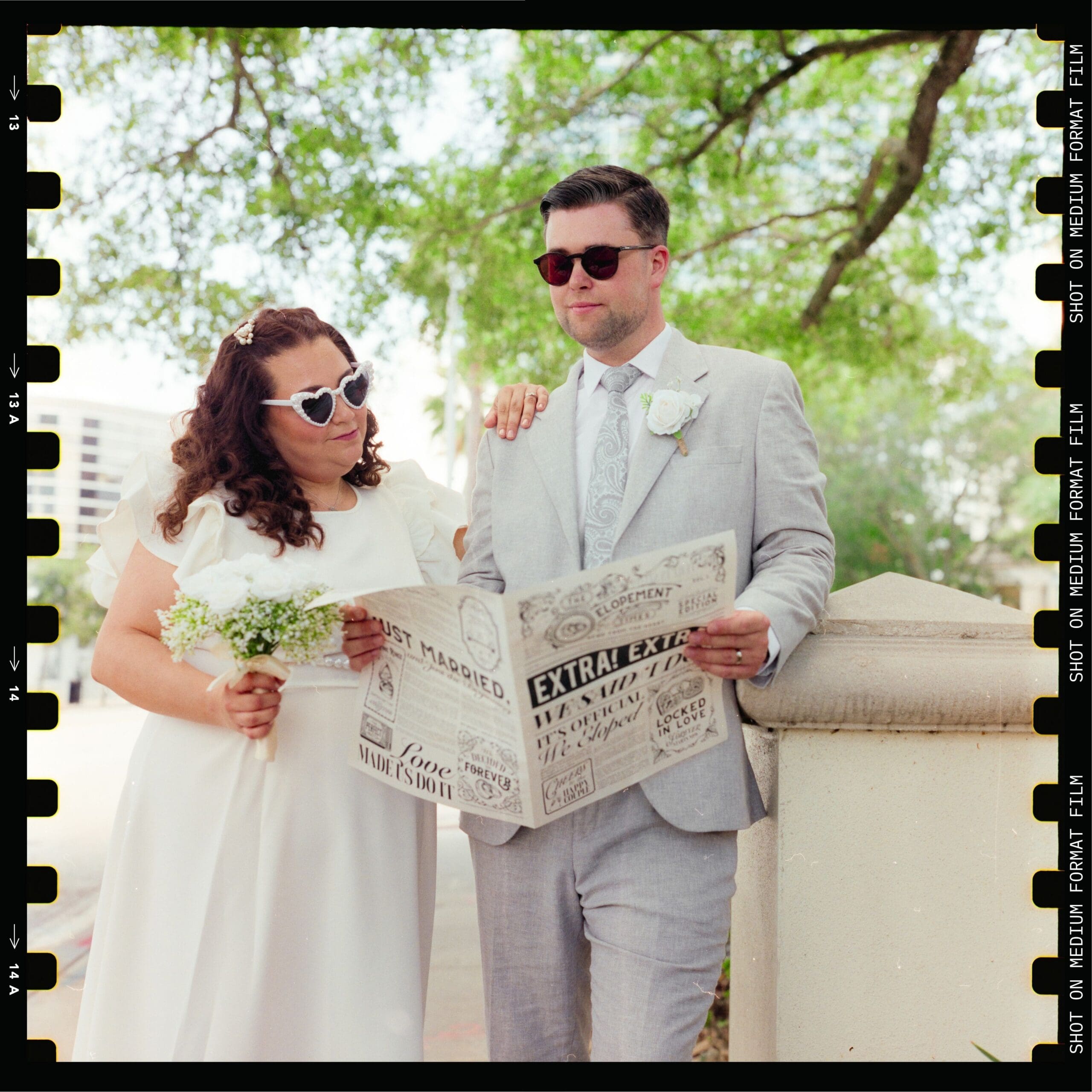 wedding photography of a newly married couple in downtown orlando photographed on medium format film
