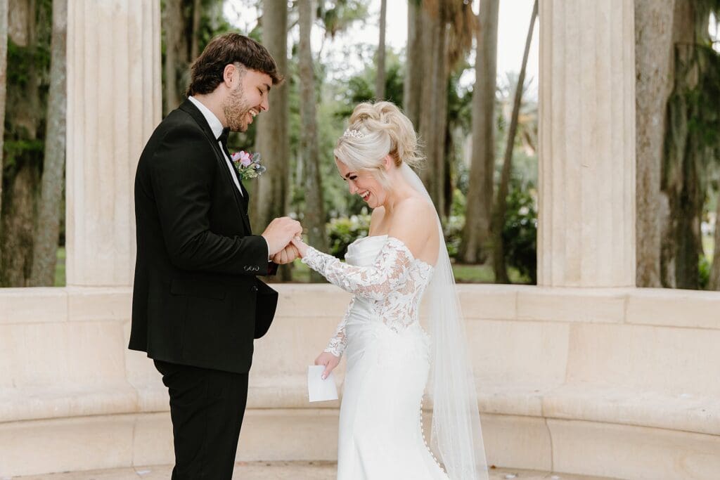 bride and groom at an elopement at the Exedra Monument at Kraft Azalea Garden in Winter Park, Florida, captured by Gracie May Photography