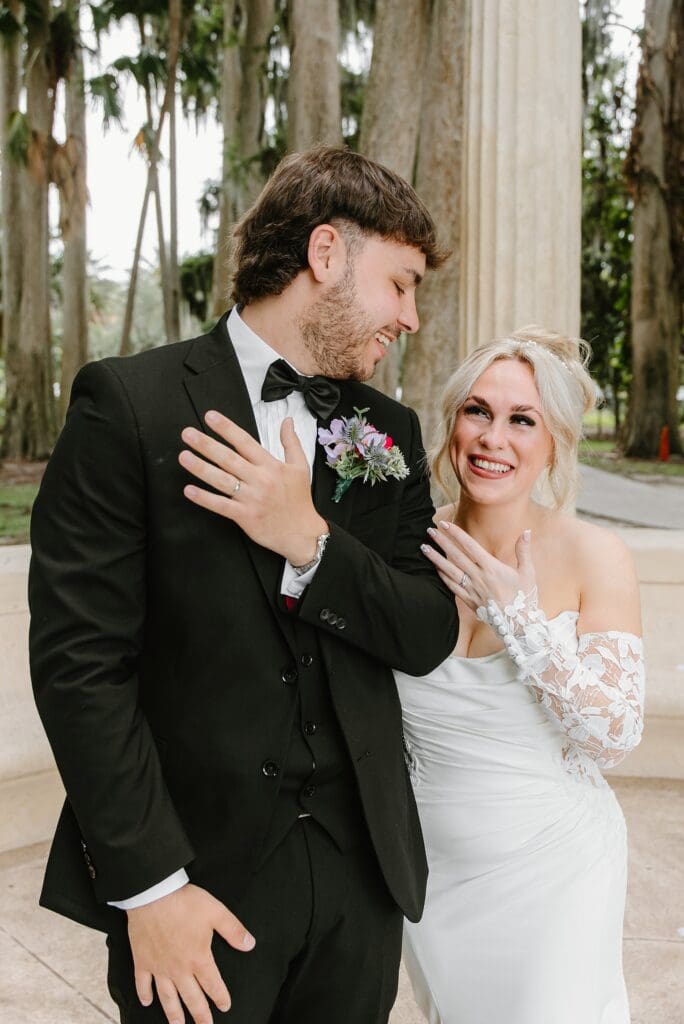 bride and groom at an elopement at the Exedra Monument at Kraft Azalea Garden in Winter Park, Florida, captured by Gracie May Photography