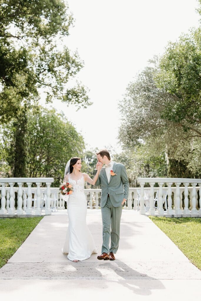 bride and groom at their nano wedding ceremony at The Landing at Harry P. Leu Gardens in Orlando, captured by micro wedding photographer Gracie May Photography.