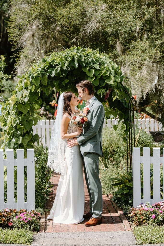 bride and groom portrait at their nano wedding at Harry P. Leu Gardens in Orlando, captured by micro wedding photographer Gracie May Photography.