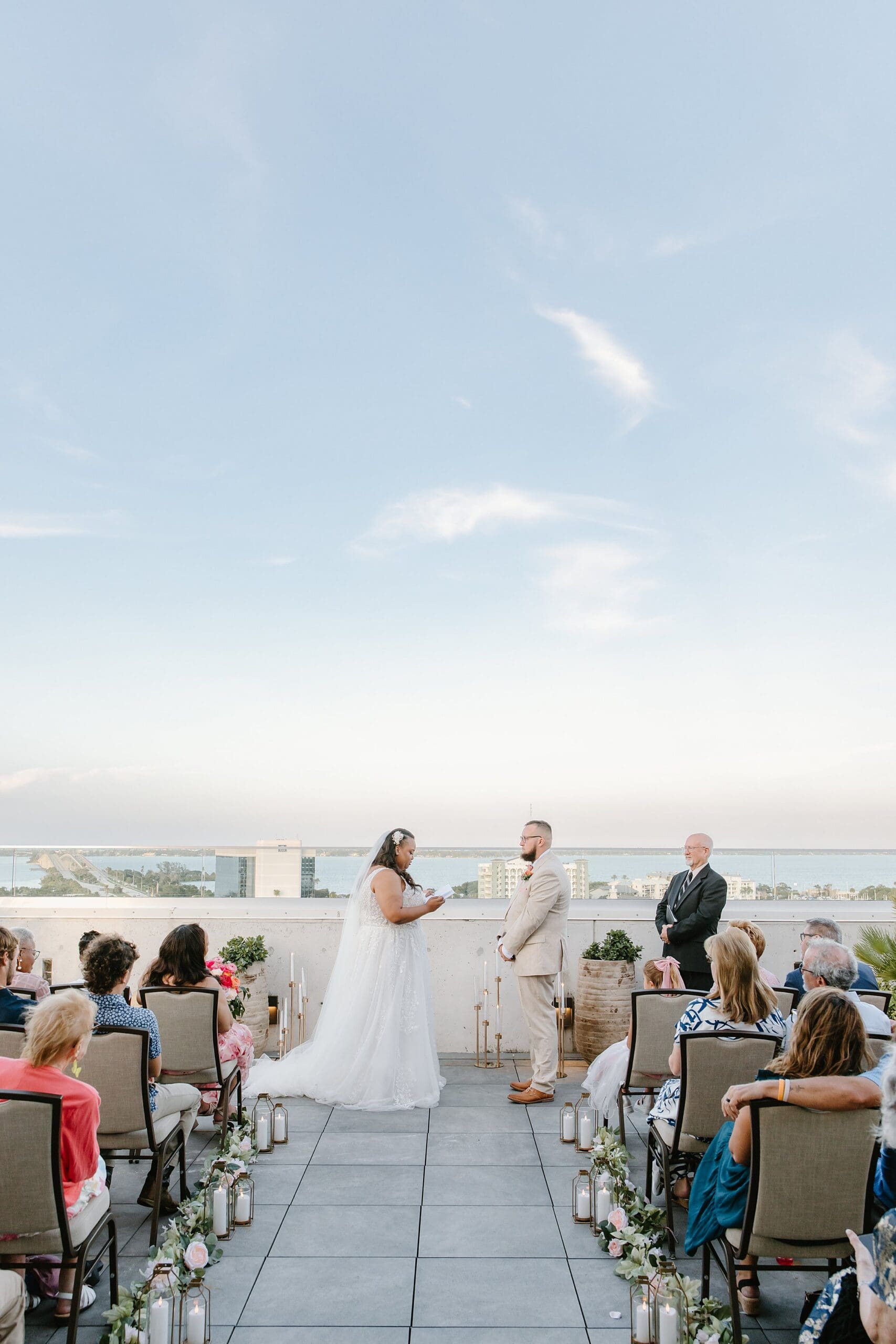 couple getting married on the rooftop during their wedding at hotel melby in melbourne florida