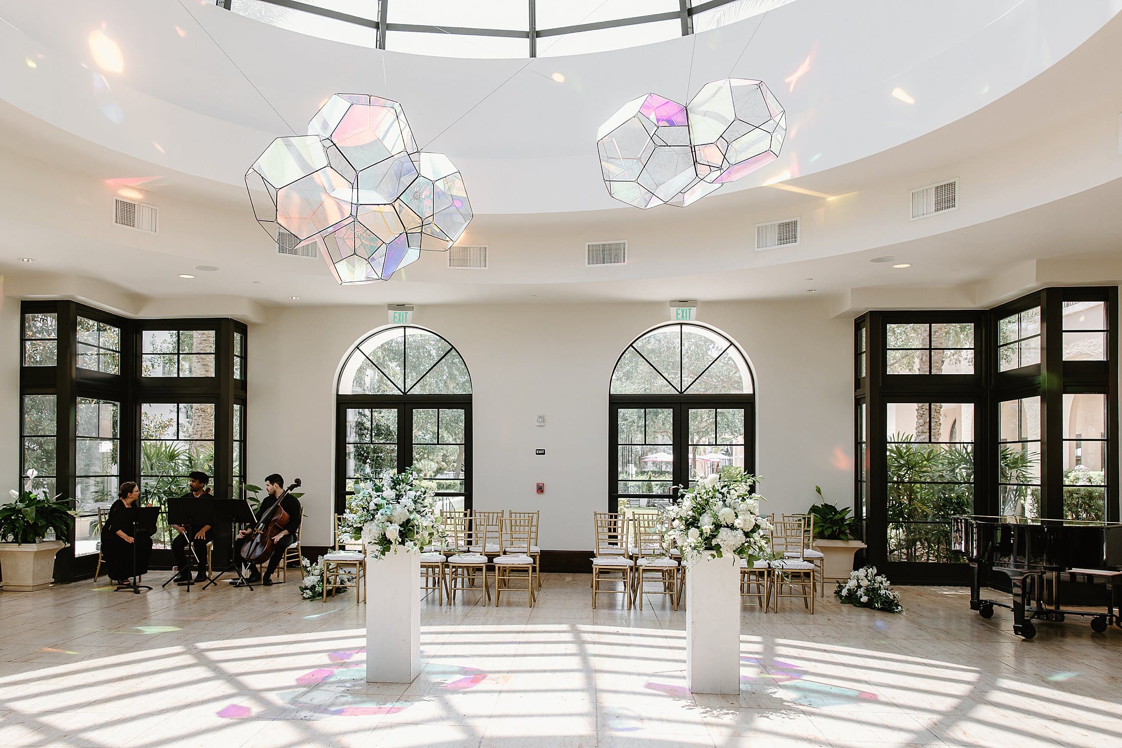 the conservatory at the alfond inn set up for a wedding ceremony