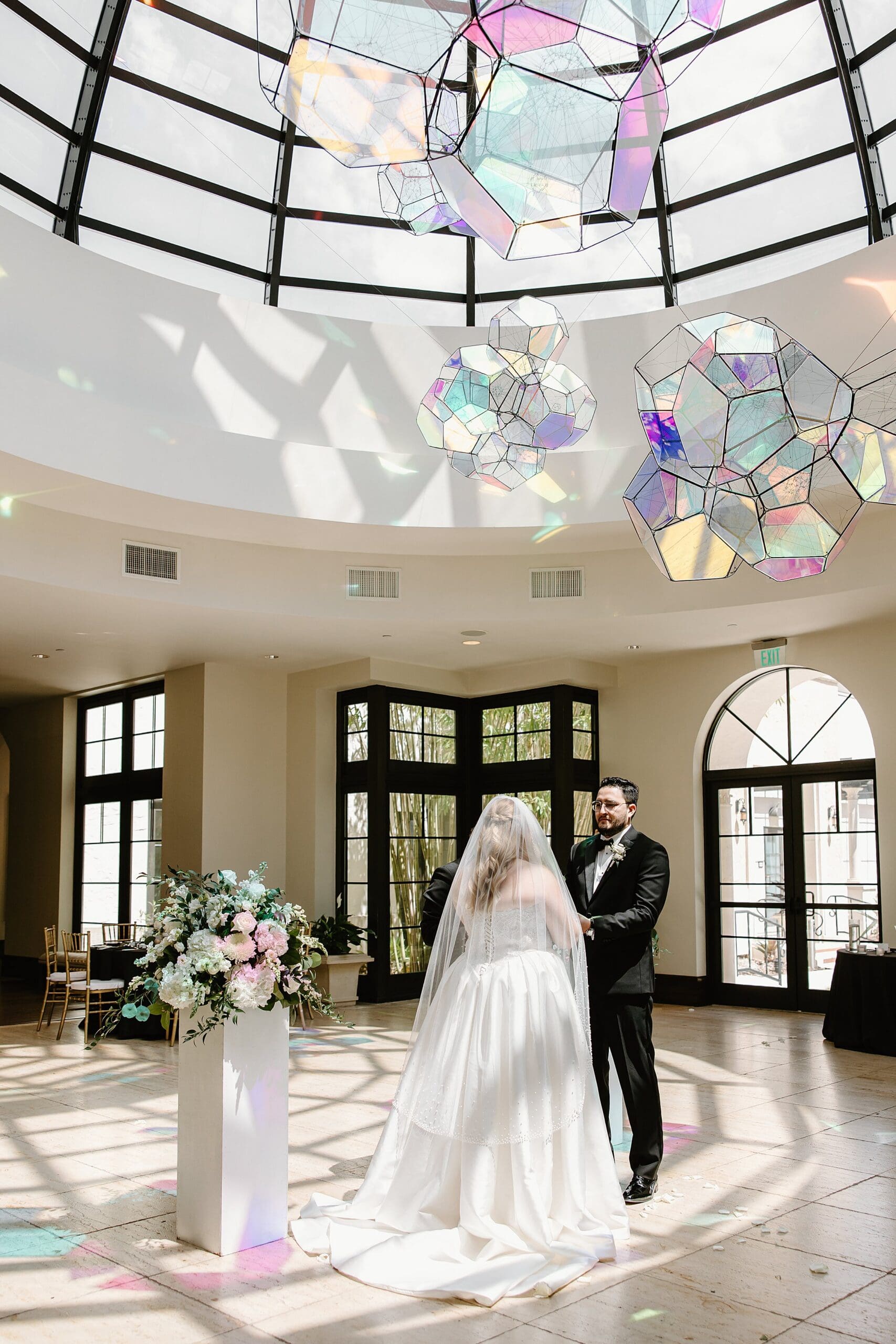 bride and groom during their marriage ceremony at the alfond inn