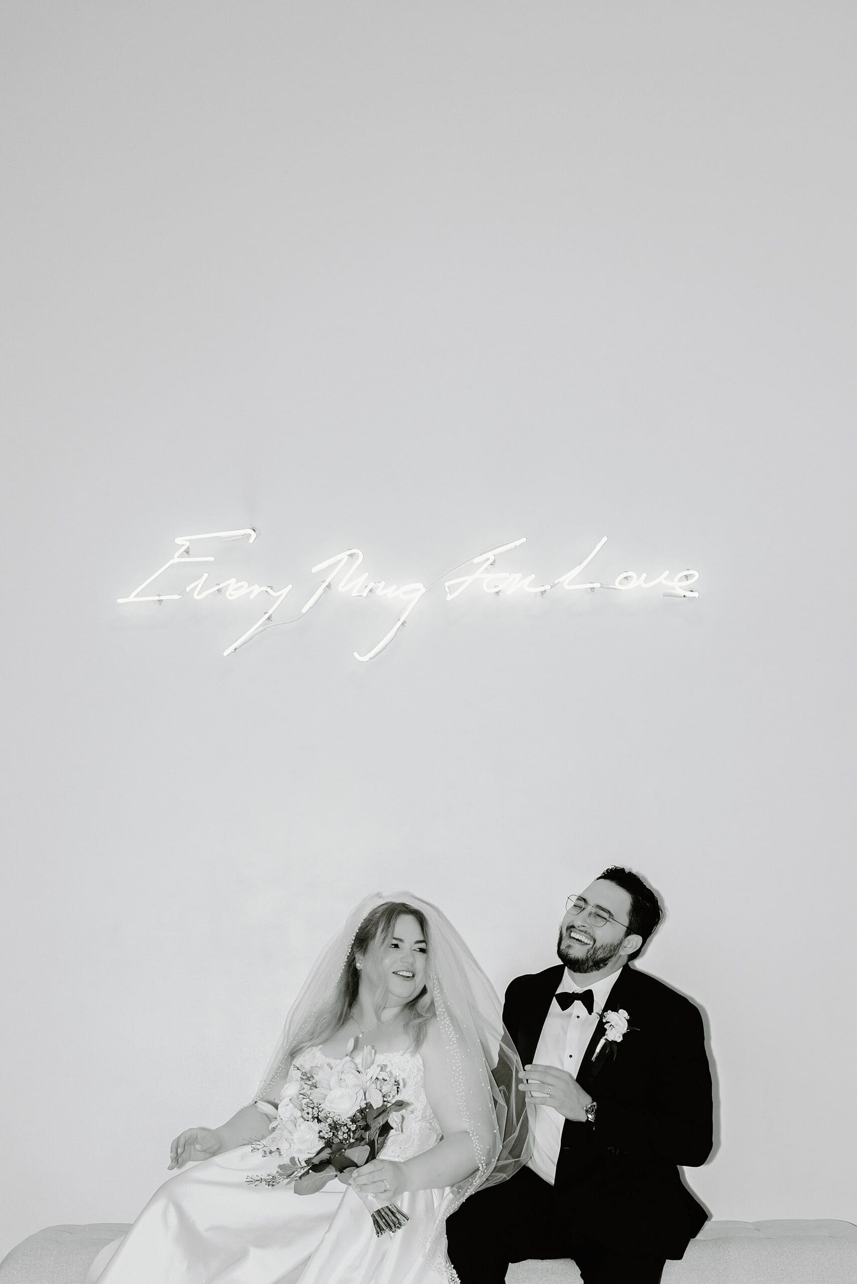 direct flash black and white photo of wedding couple during their couples session at the alfond inn