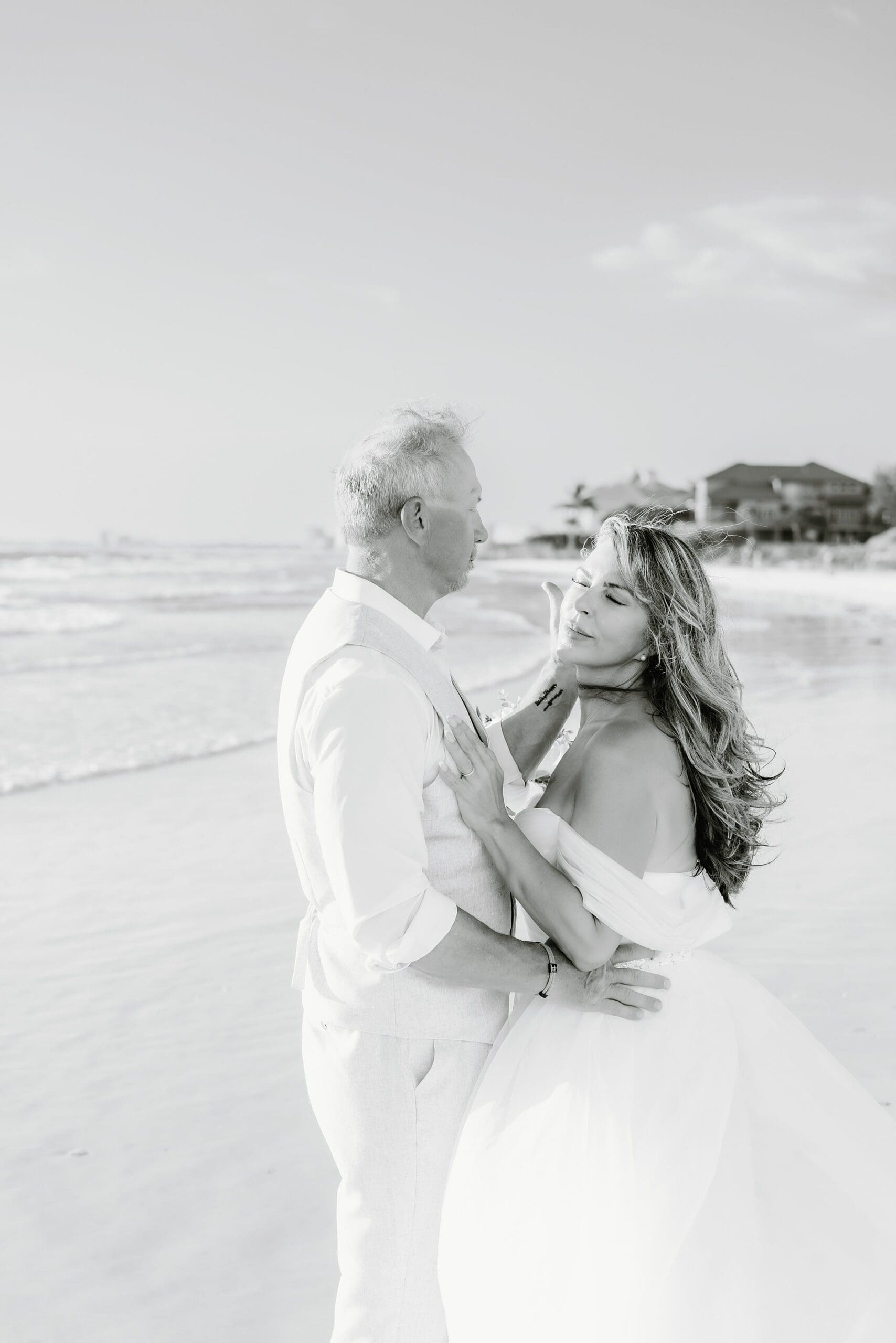 black and white image of a couple during their wedding at siesta key beach in sarasota florida