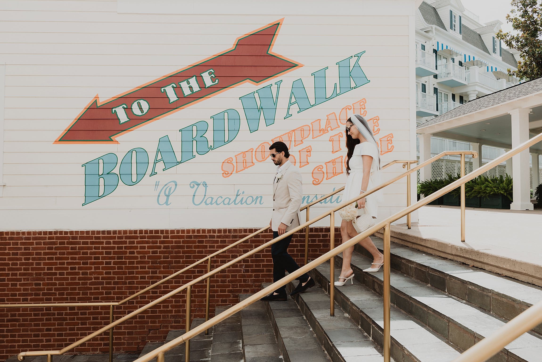 couple after their wedding at the disney boardwalk