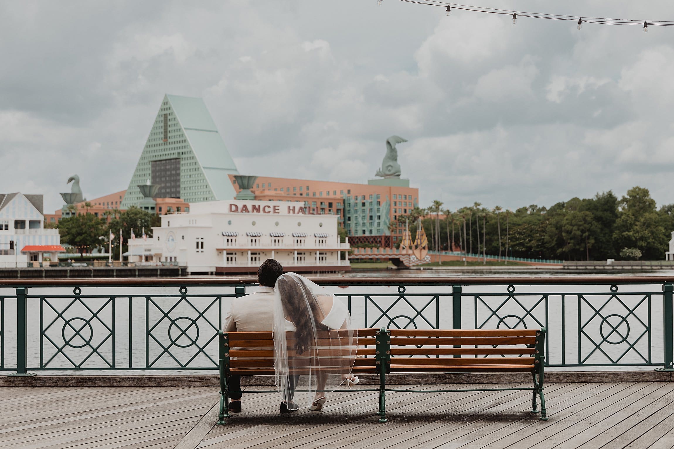 couple at the disney boardwalk after their orlando courthouse wedding